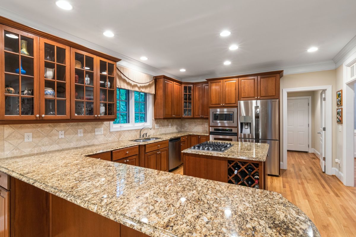 White granite countertops gray cabinets